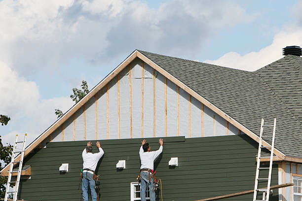 Professional Siding Installation technician working in Worthington, KY